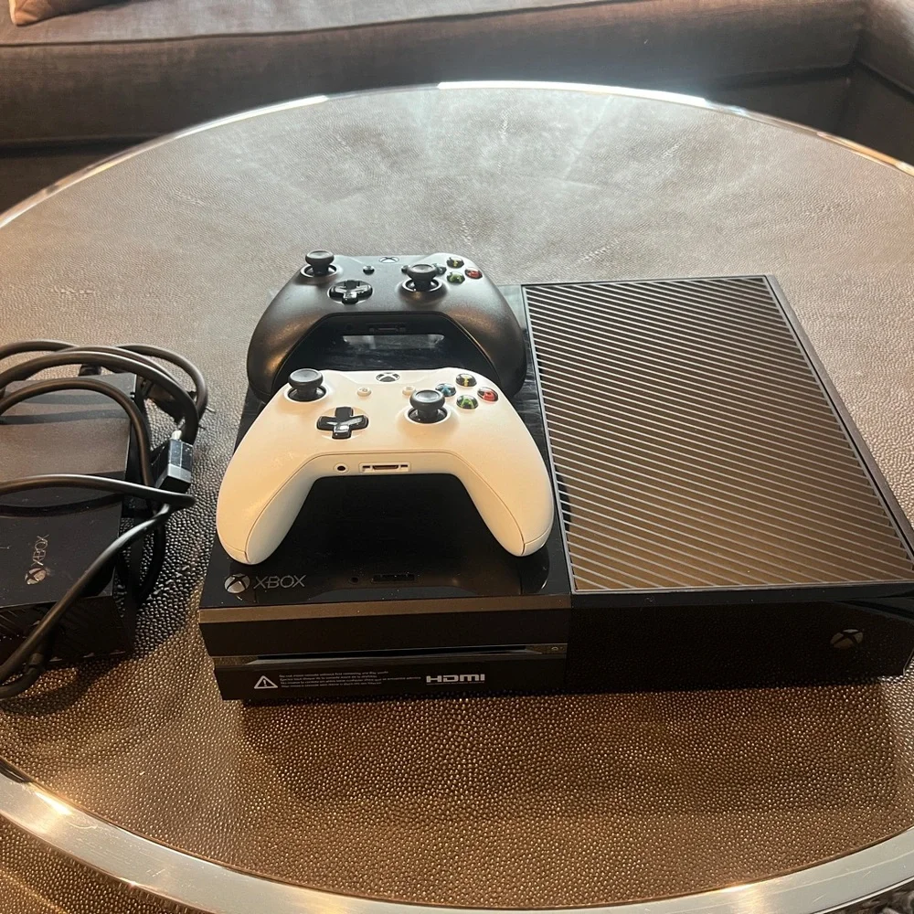 Console with Black and White Controllers